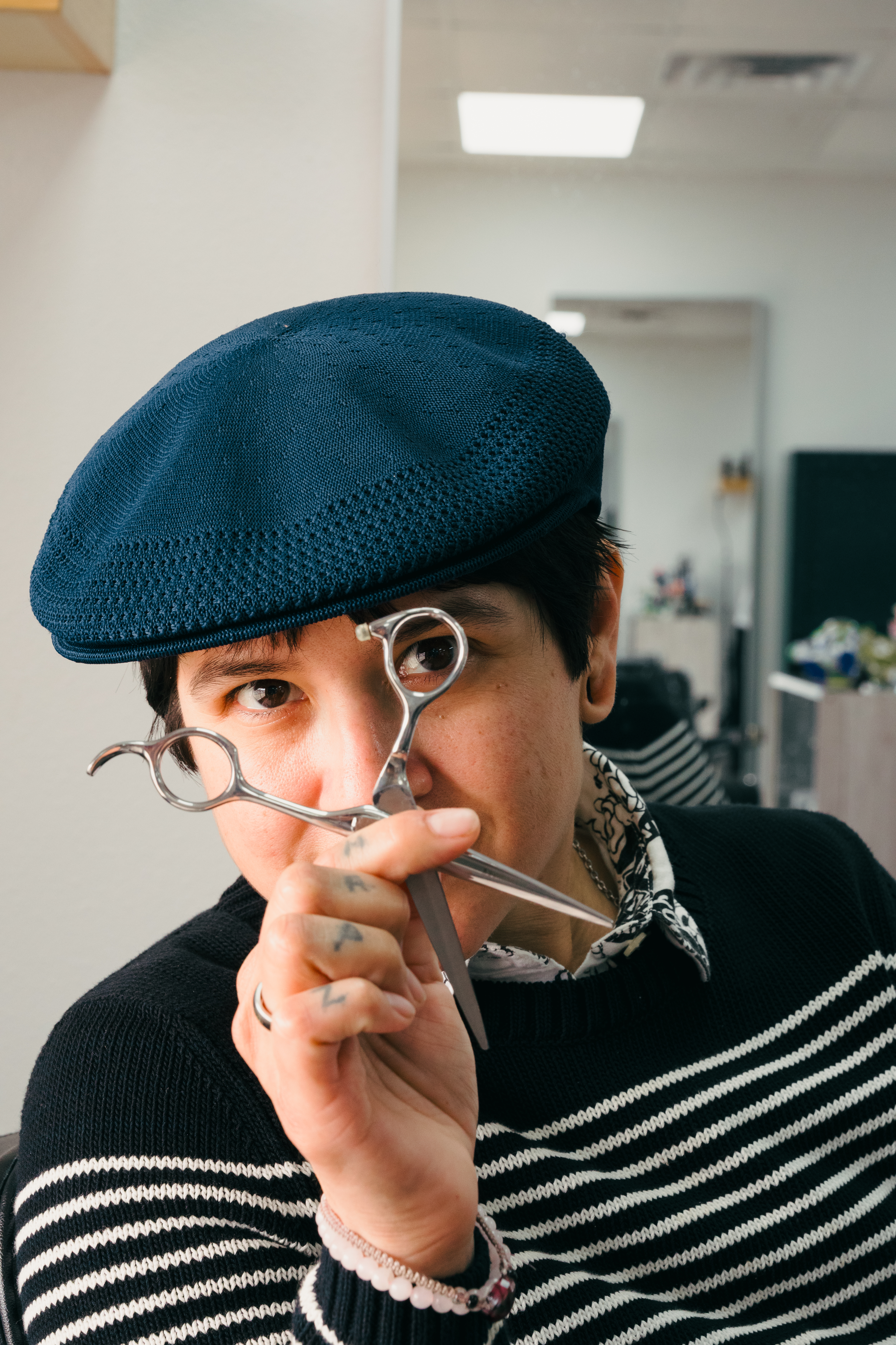 Inspire Hair Studio Barber using clippers